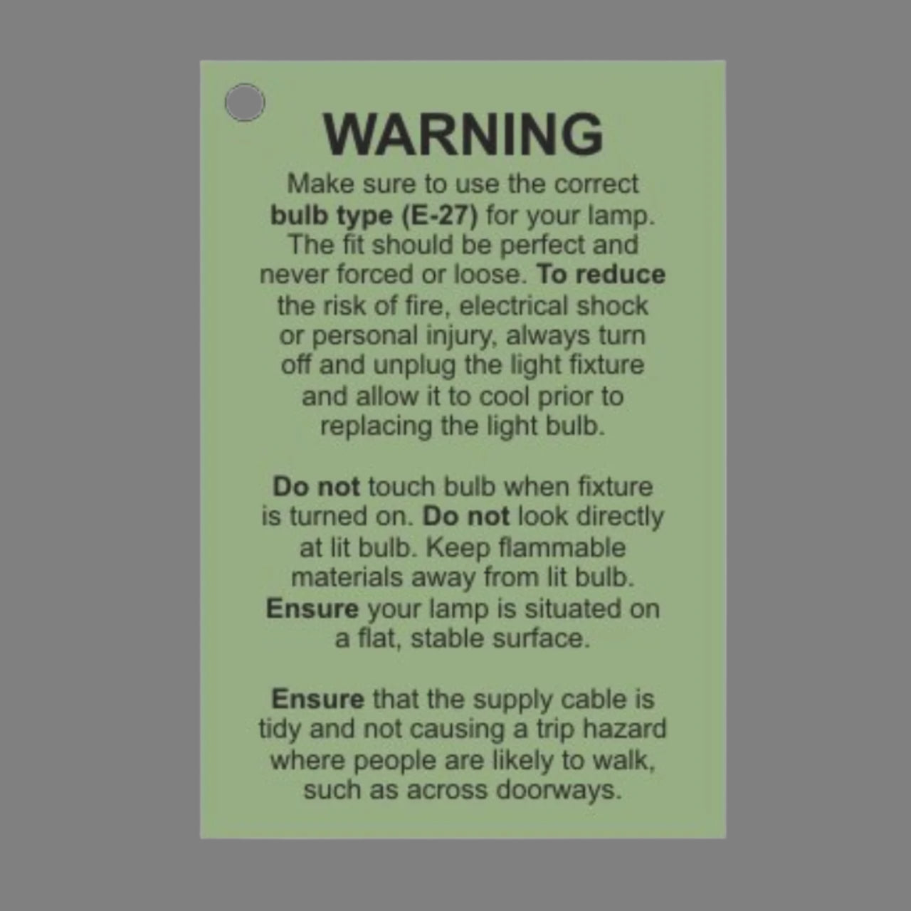 Care label for the Chrome Tripod Spotlight Floor Lamp, providing important product information and maintenance guidelines.