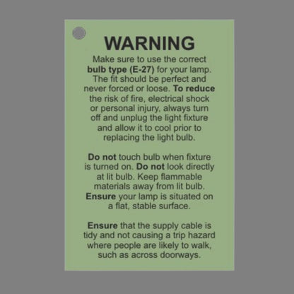 Care label for the Chrome Tripod Spotlight Floor Lamp, providing important product information and maintenance guidelines.