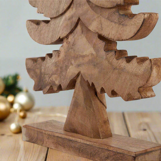 close up view of bottom of free standing wooden tree decoration, highlighting the study bottom stand. Shop at Purple Flamingo UK