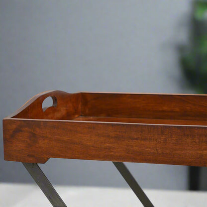 Close-up of the wooden tray's textured surface, highlighting its handcrafted rustic finish.