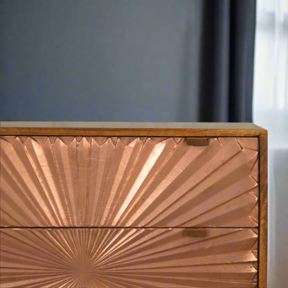Close-up of copper inlay drawer detailing on upper section, emphasizing artisanal touch and luxury finish.