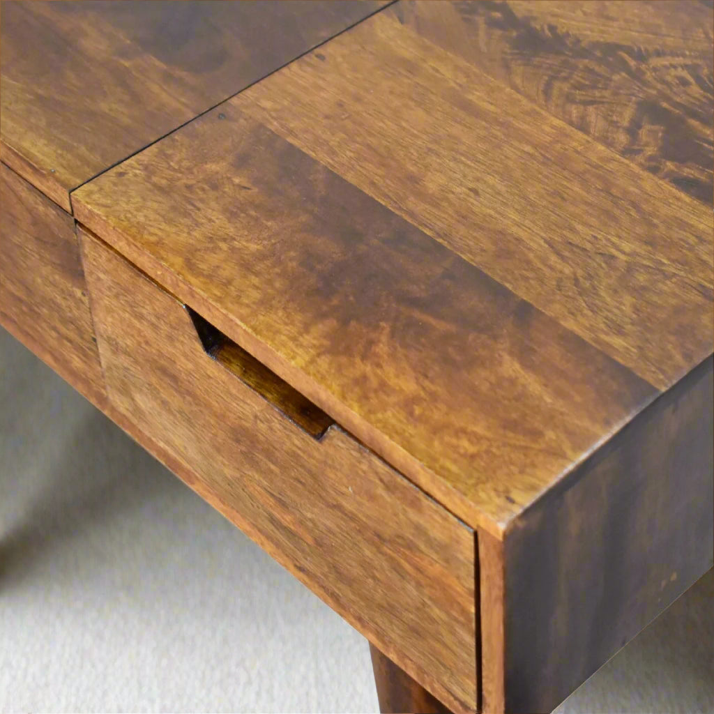 Top‑down view of left drawer interior highlighting wood grain
