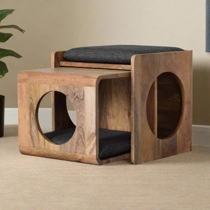 Multi-functional pet bed that doubles as a seat, with the pet bed removed halfway to show the plush interior pad for cats or small dogs.