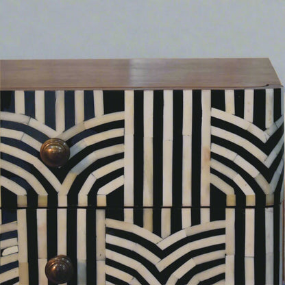 Close-up of the Edessa Bone Inlay 2 Drawer Bedside Table, showing the intricate bone inlay pattern, knobs, and smooth upper surface.
