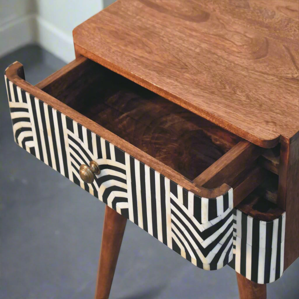 Top-down view of the Edessa Bone Inlay 2 Drawer Bedside Table with the upper drawer pulled out, revealing internal storage space and upper surface.