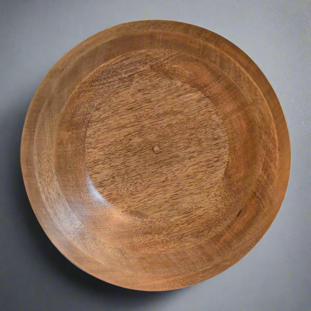 Aerial view of one Floral Bird Bowl that is placed upside down on a cream surface.