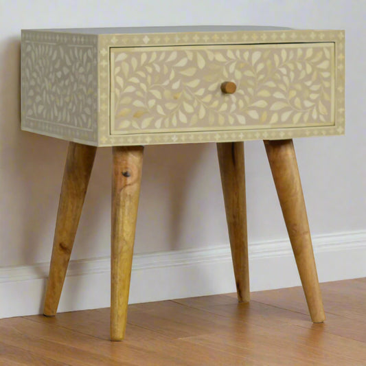 Angled view of the Floral Bone Inlay 1 Drawer Bedside Table in grey, displaying all four Nordic style legs and the oak-ish finish base.
