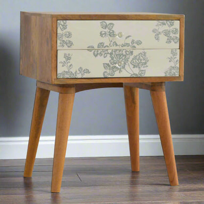 Angled front view of the Green Floral Screen Printed 2 Drawer Bedside Table, showcasing all four Nordic style legs and the printed drawer fronts.
