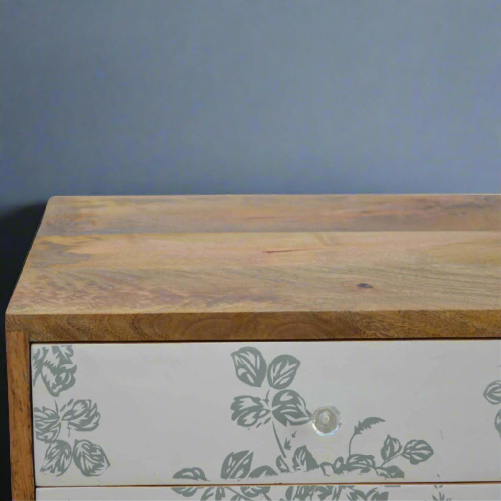  Elevated front view of the Green Floral Screen Printed 2 Drawer Bedside Table, showing the top surface and the detailed green floral pattern on the drawer fronts.