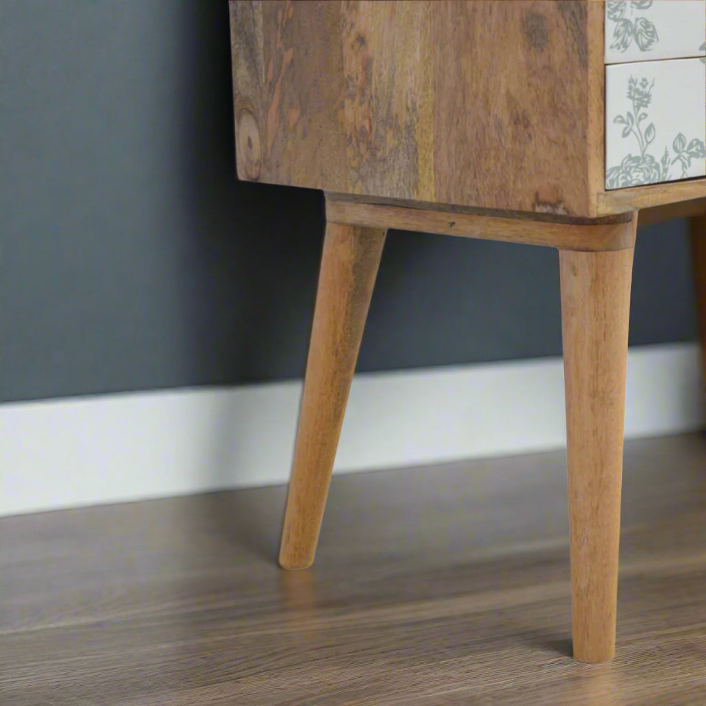 Side view of the Green Floral Screen Printed 2 Drawer Bedside Table, showing its right side and the Nordic style legs from that angle.