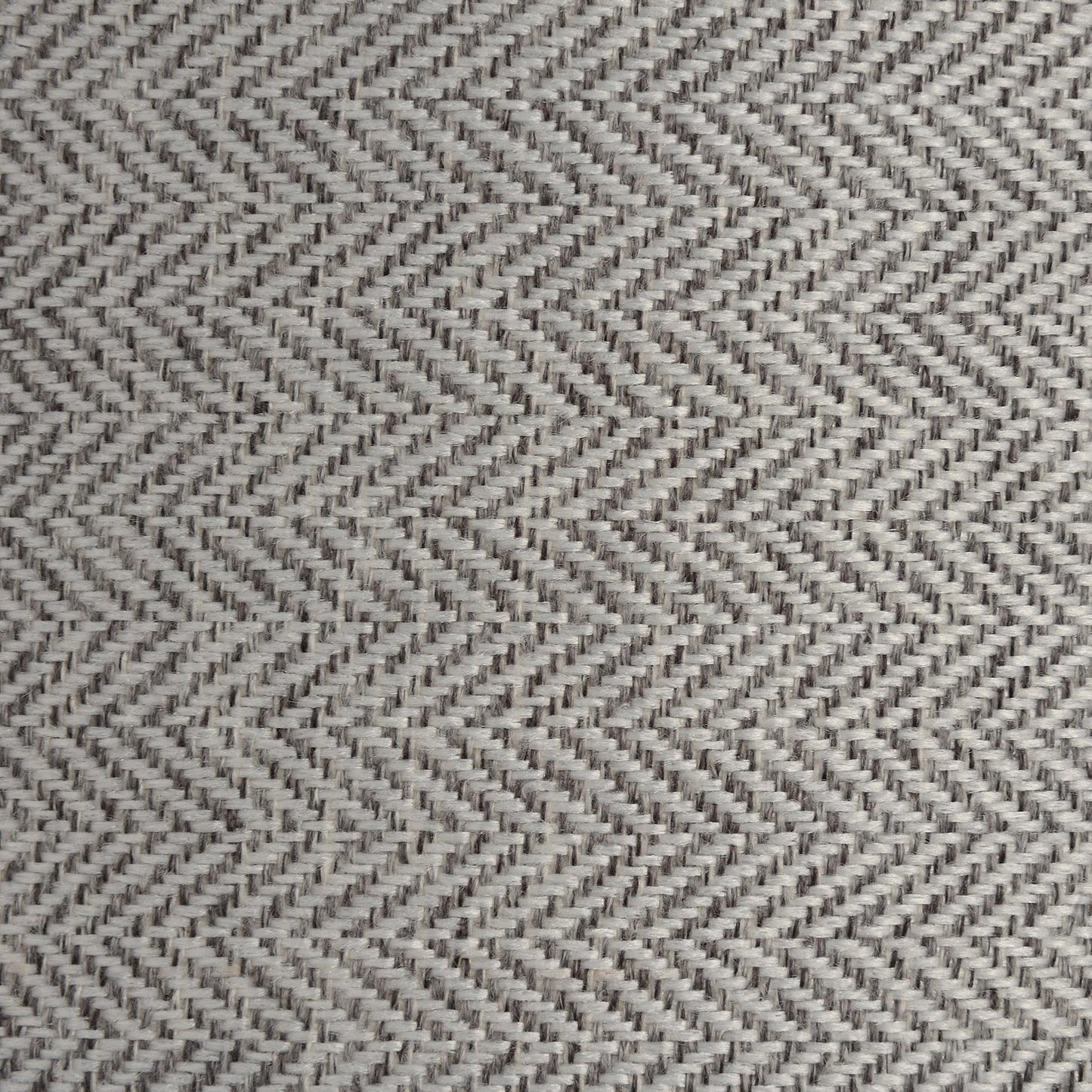 Detailed shot of the grey and white herringbone fabric lampshade, highlighting its refined woven texture and neutral tones.