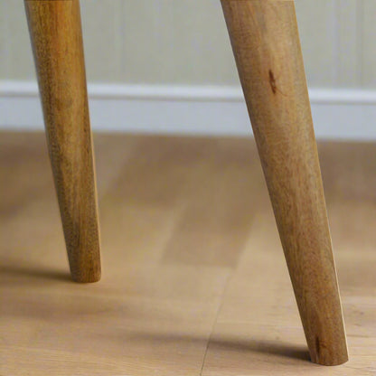 Macro shot of leg base showing weathered finish and floor base
