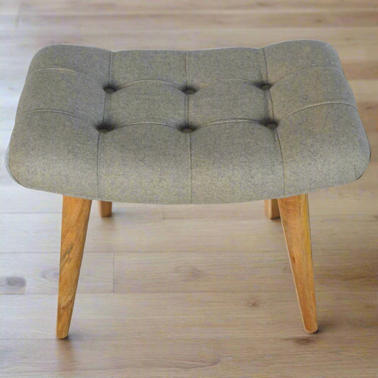 Top‑down side view highlighting tweed fabric weave and seat contour