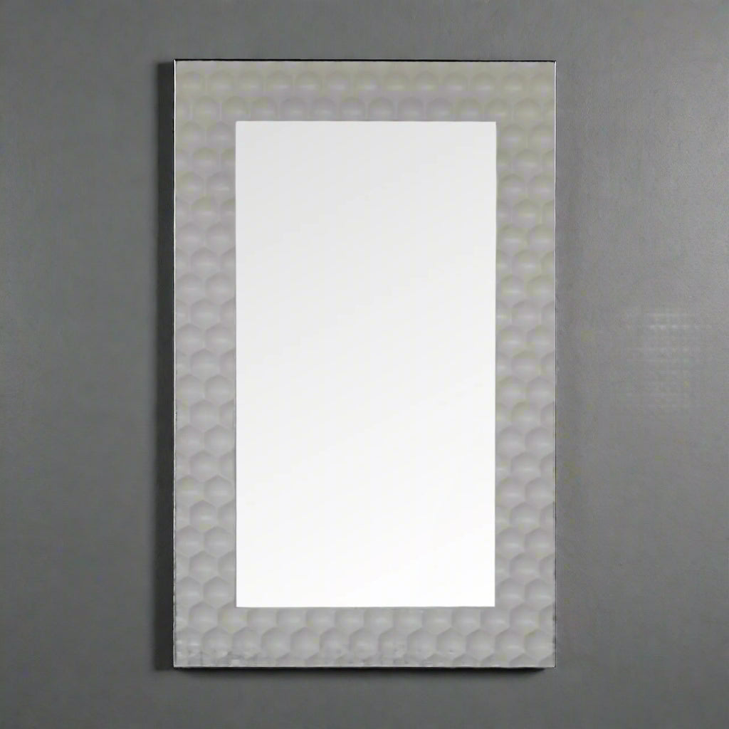 Rectangular Honeycomb Mirror mounted vertically on a grey wall, showing the white hand-carved frame.