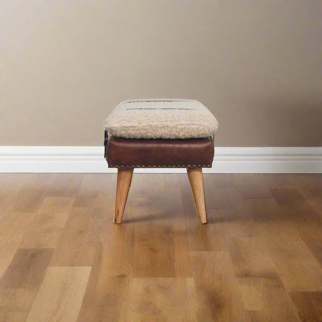 Side profile view of the Leather Bouclé X Bench highlighting length and structure