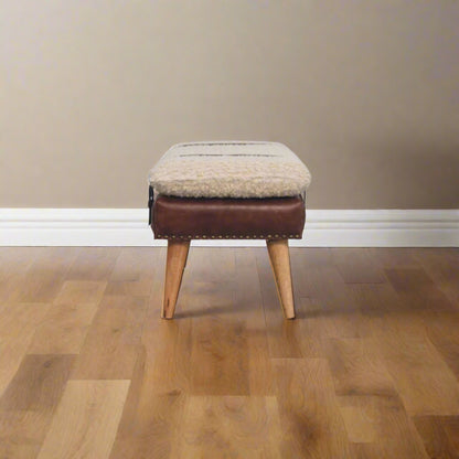 Side profile view of the Leather Bouclé X Bench highlighting length and structure
