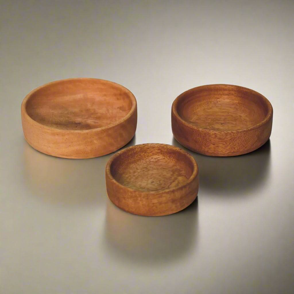 Close-up from above of the bowls arranged for visual impact on white countertop.