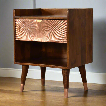 Angled view of the Manila Copper 1 Drawer Bedside Table, showing its left side, front, and all four Nordic style brass-capped feet.