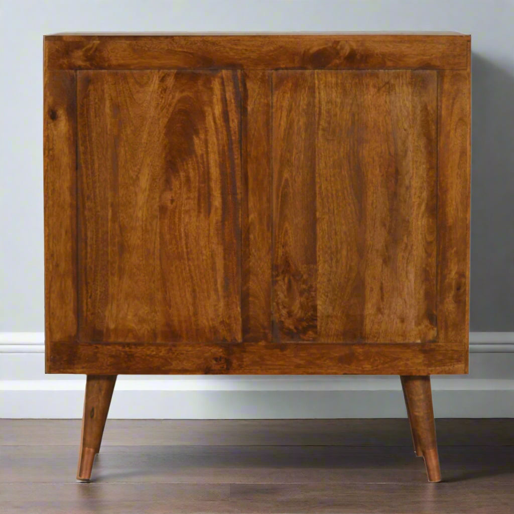 Back of the copper chest showing full wood panel and leg support, demonstrating design quality.