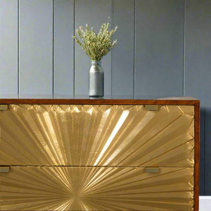 Close‑up of top left corner with decorative plant on chestnut surface
