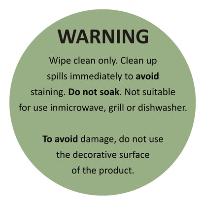 A green circular warning label detailing care instructions for the chopping board, including warnings against soaking and using in microwave or grill.