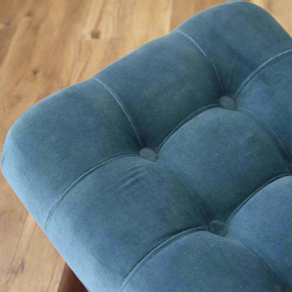 Aerial shot of the mini teal velvet curve bench seat, clearly displaying its intricate deep button pattern.