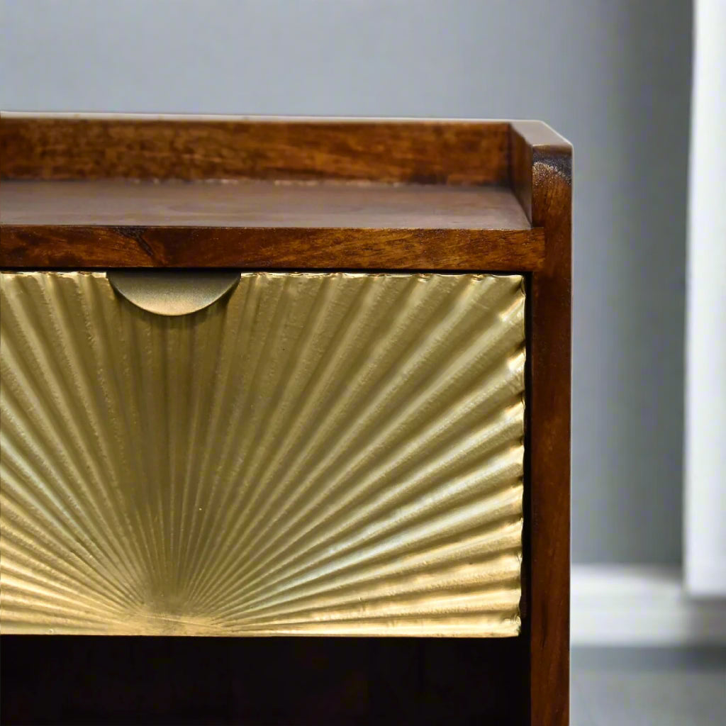 Close‑up of sunrise pattern drawer and smooth top surface