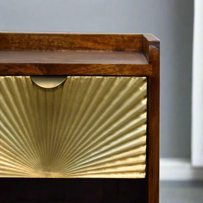 Close‑up of sunrise pattern drawer and smooth top surface