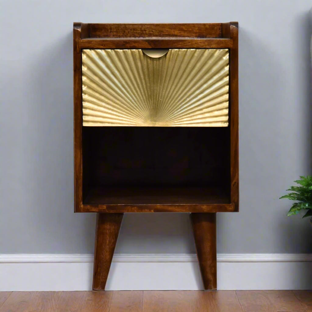 Straight‑on view highlighting the brass‑plated drawer face and shelf