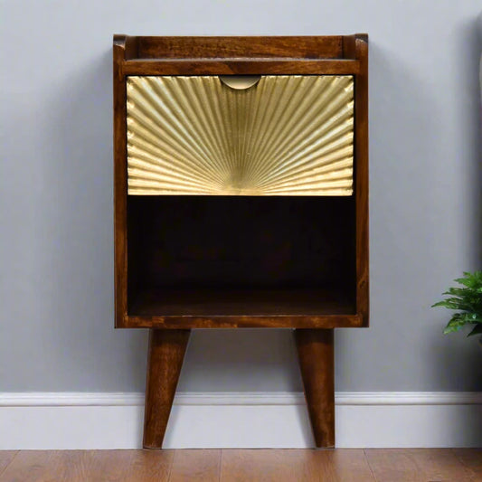 Straight‑on view highlighting the brass‑plated drawer face and shelf