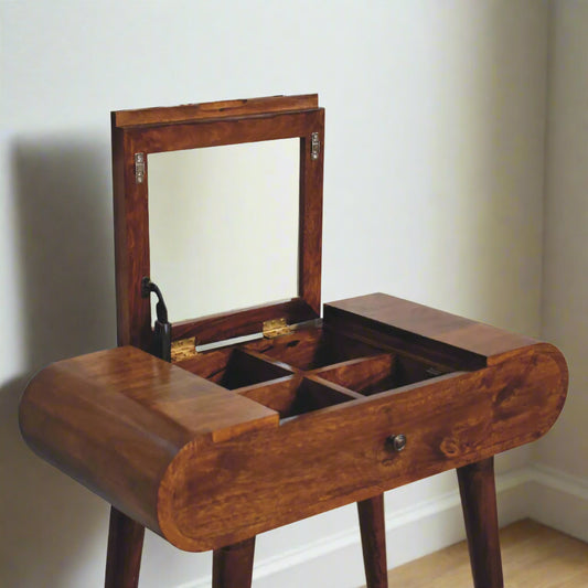 Elevated angled view showing mirror raised and four storage compartments
