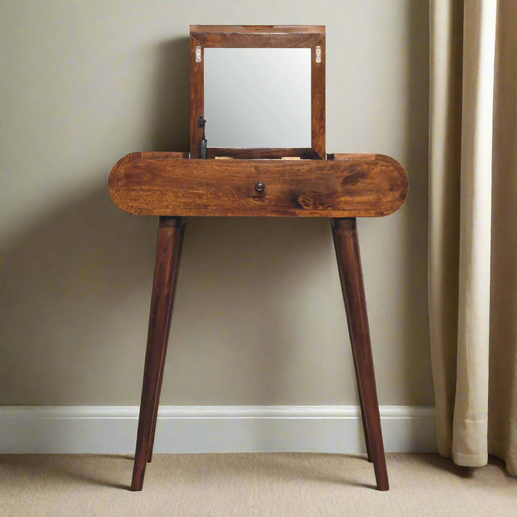 Direct front view with mirror up, highlighting compact design