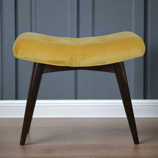 Front view of the Mustard Velvet Curve Stool, showcasing its elegant curve and Nordic style legs.