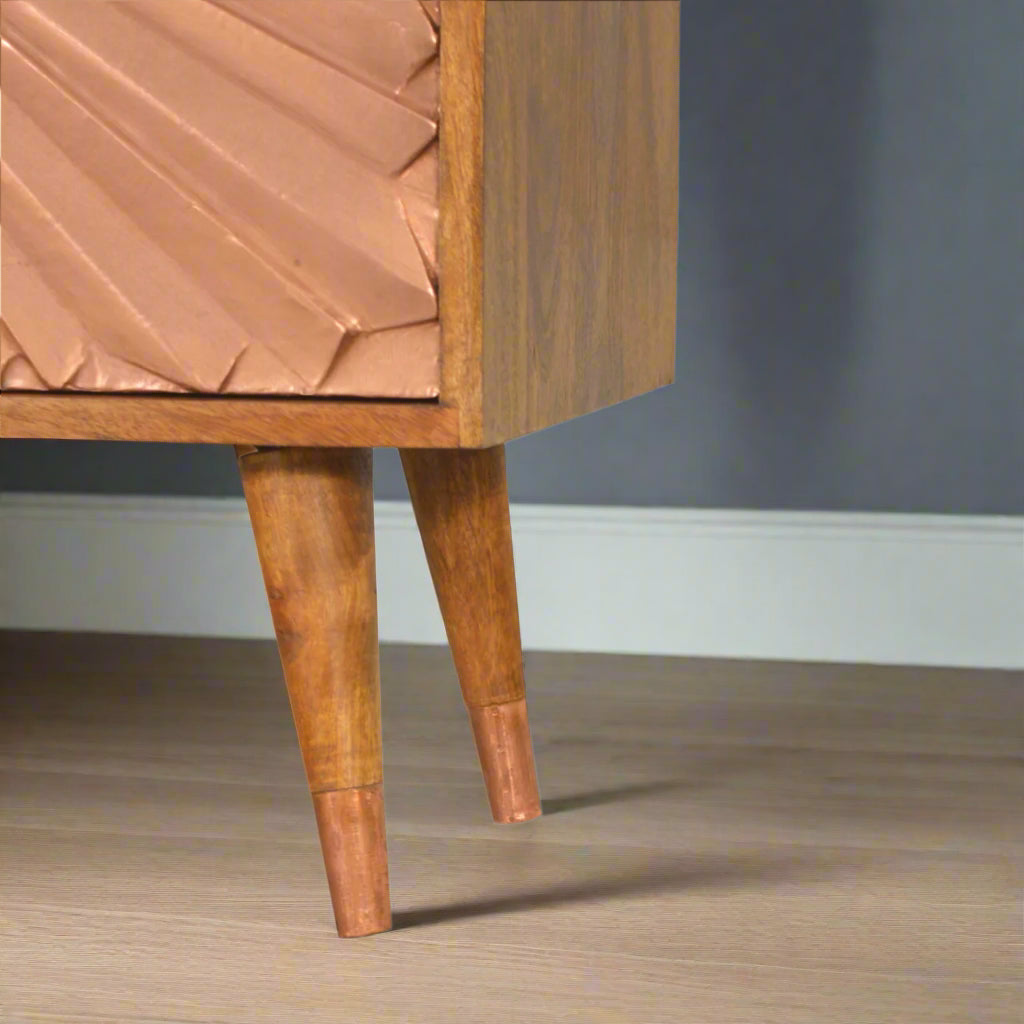 Bottom shot displaying Nordic-style tapered legs and base craftsmanship of chest.