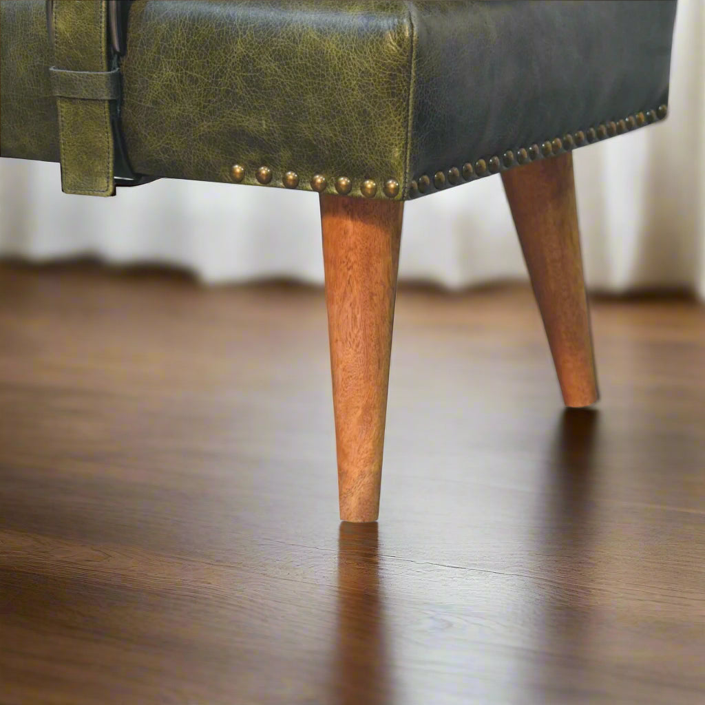 Close-up view of the Nordic style legs of the Olive Green Leather Boucle Bench.