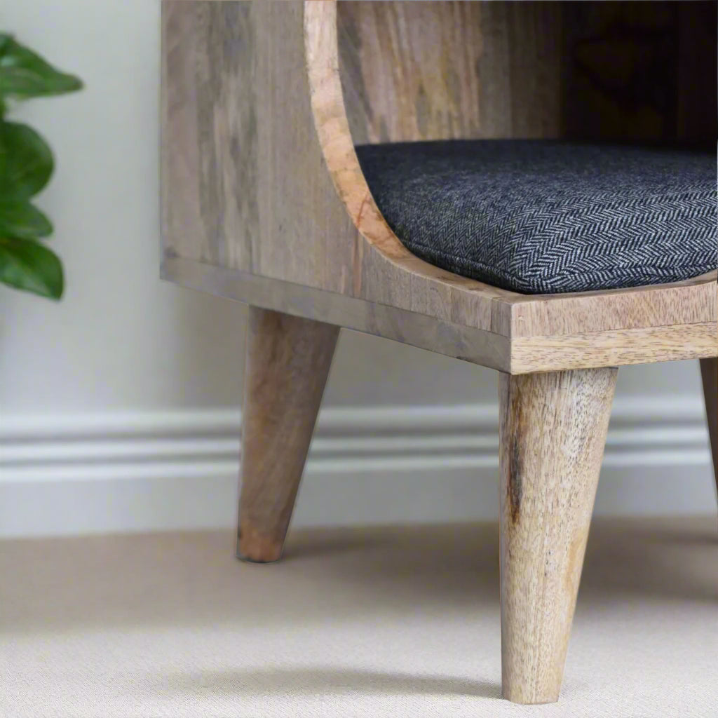 Close-up of the interior showing the soft, padded black tweed cushion, perfect for a small dog or cat to curl up comfortably.