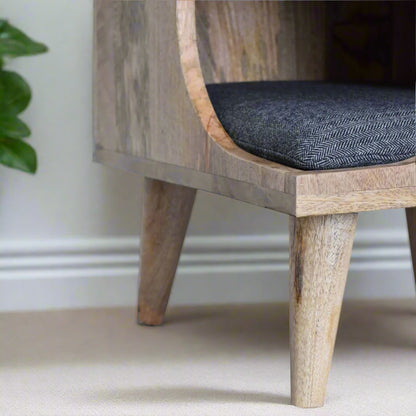 Close-up of the interior showing the soft, padded black tweed cushion, perfect for a small dog or cat to curl up comfortably.