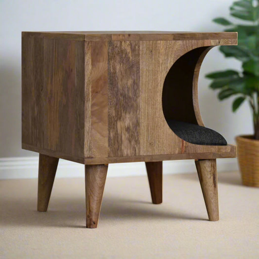 Side view of the pet bed with four Nordic-style wooden legs and natural grain detail, adding a warm rustic touch to interior decor.