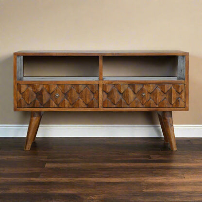 Front view of chestnut finish pineapple carved mango wood media unit with 2 open shelves and Nordic legs