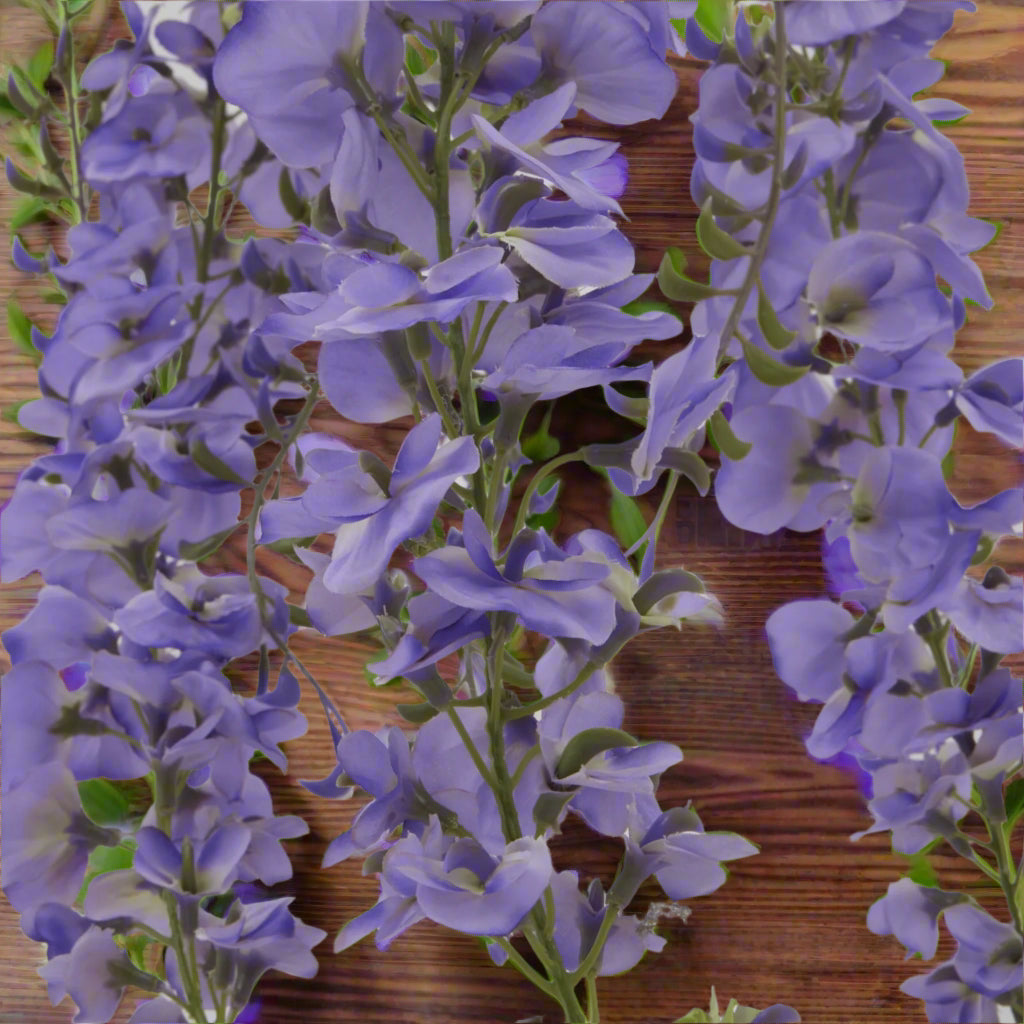 Aerial close-up of the deep purple wisteria flower cluster.