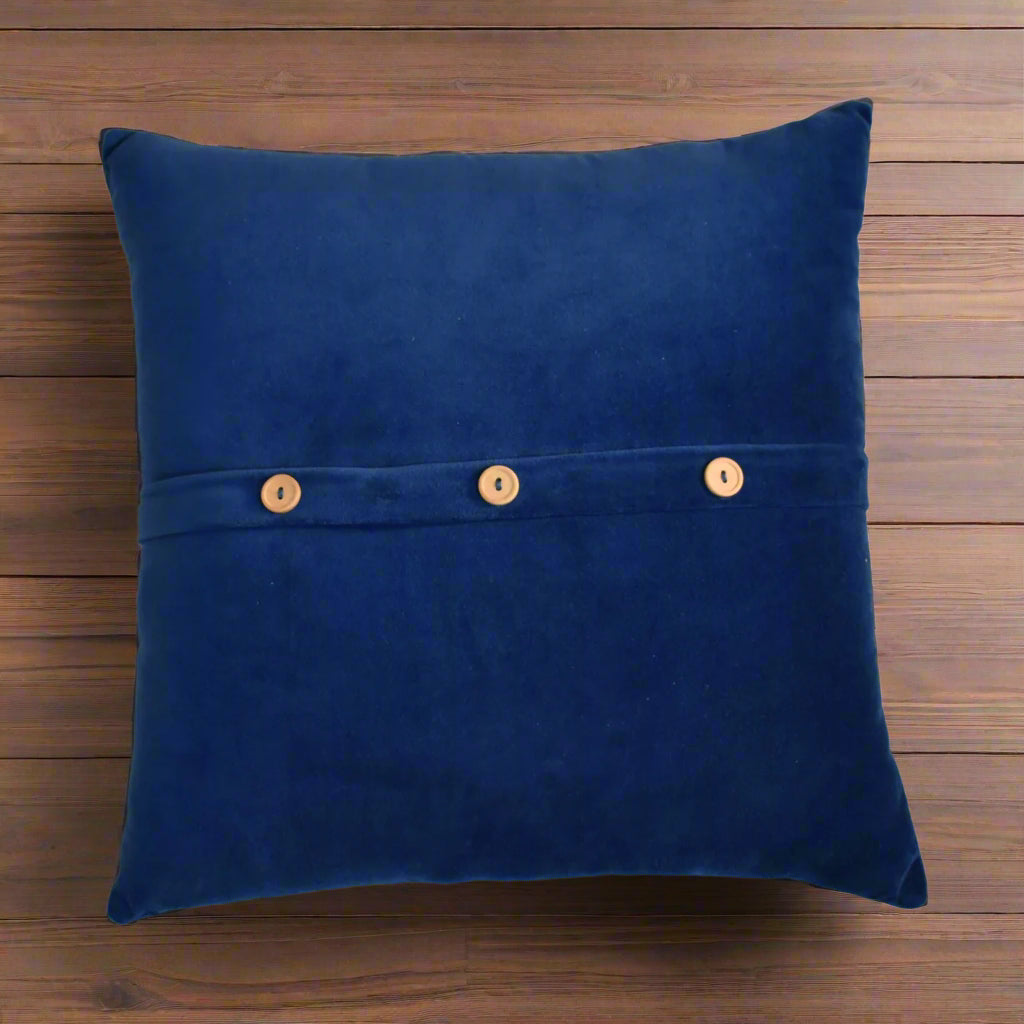 Top-down view of a single Quinn cushion showing the button-down design.