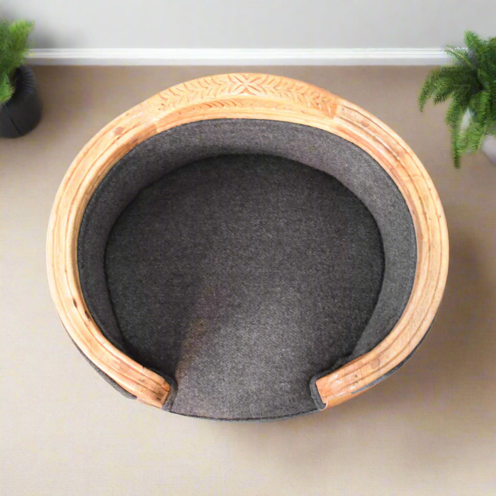 Overhead view of the round tweed pet bed, showing plush interior space and ergonomic design for pet comfort.