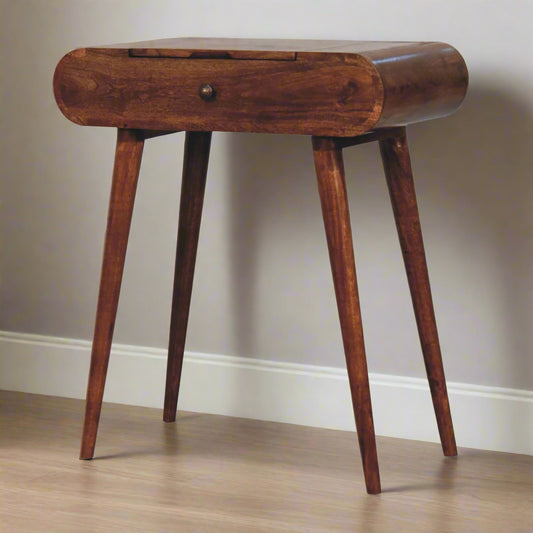 Rounded mini dressing table with honey caramel finish, showcasing front view with closed mirror