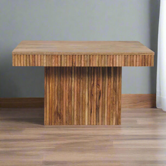Front view of the Soba Chunky Coffee Table, positioned on a wooden floor, highlighting its design.