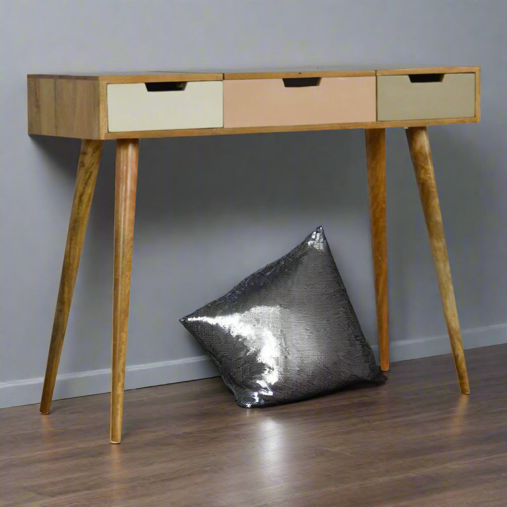 Solid mango wood straight edge dressing table showing under-table storage space with decorative silver accessories, highlighting the Nordic style tapered legs