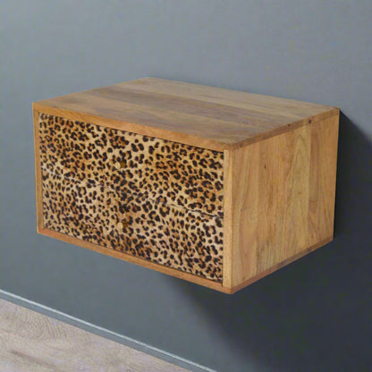 Elevated side view of the wall mounted leopard print drawer table, providing a comprehensive look at its structure from above.