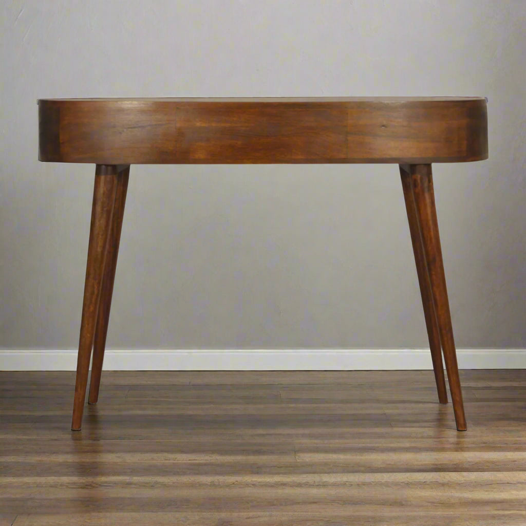Back view of the Wave Desk, showcasing the consistent chestnut wood finish on all sides of the solid mango wood construction.