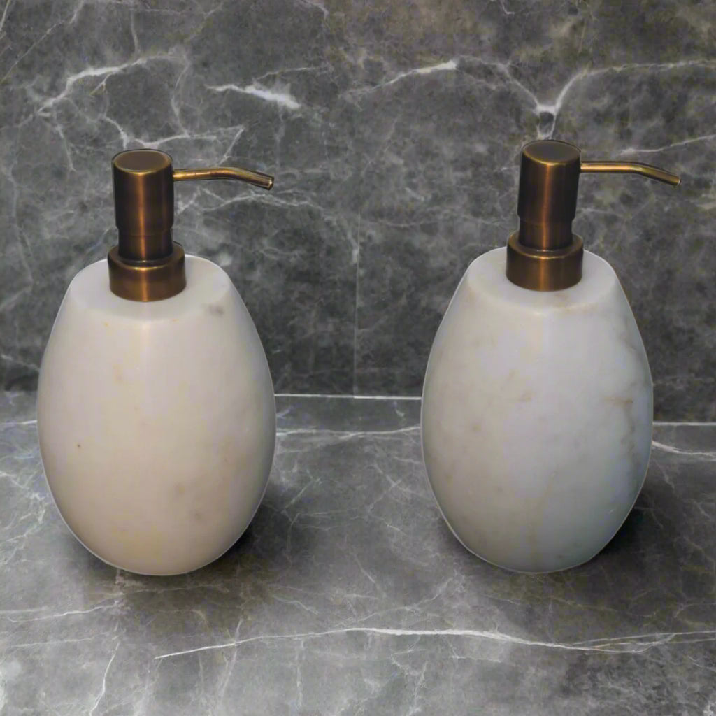 Elevated shot of both white marble dispensers.