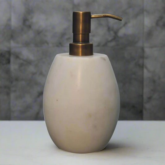 Front view of a single white marble dispenser.