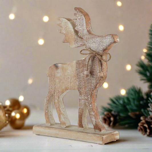 A beautiful white wash wooden sparkle stag decoration with a rustic finish and subtle glitter, perfect for festive or natural home decor.